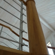 Spiraltrappor i ek med railing räcken i rostfritt.